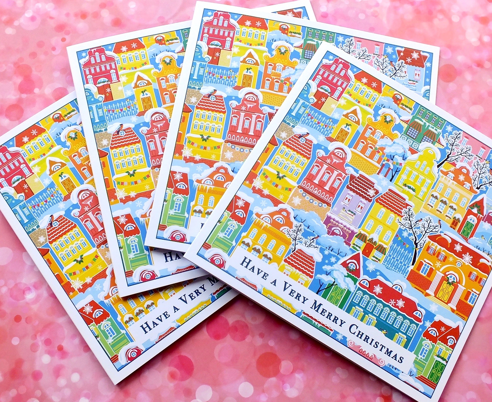 Pack of 4 Colourful Christmas Cards - Snowy Town Houses Pack