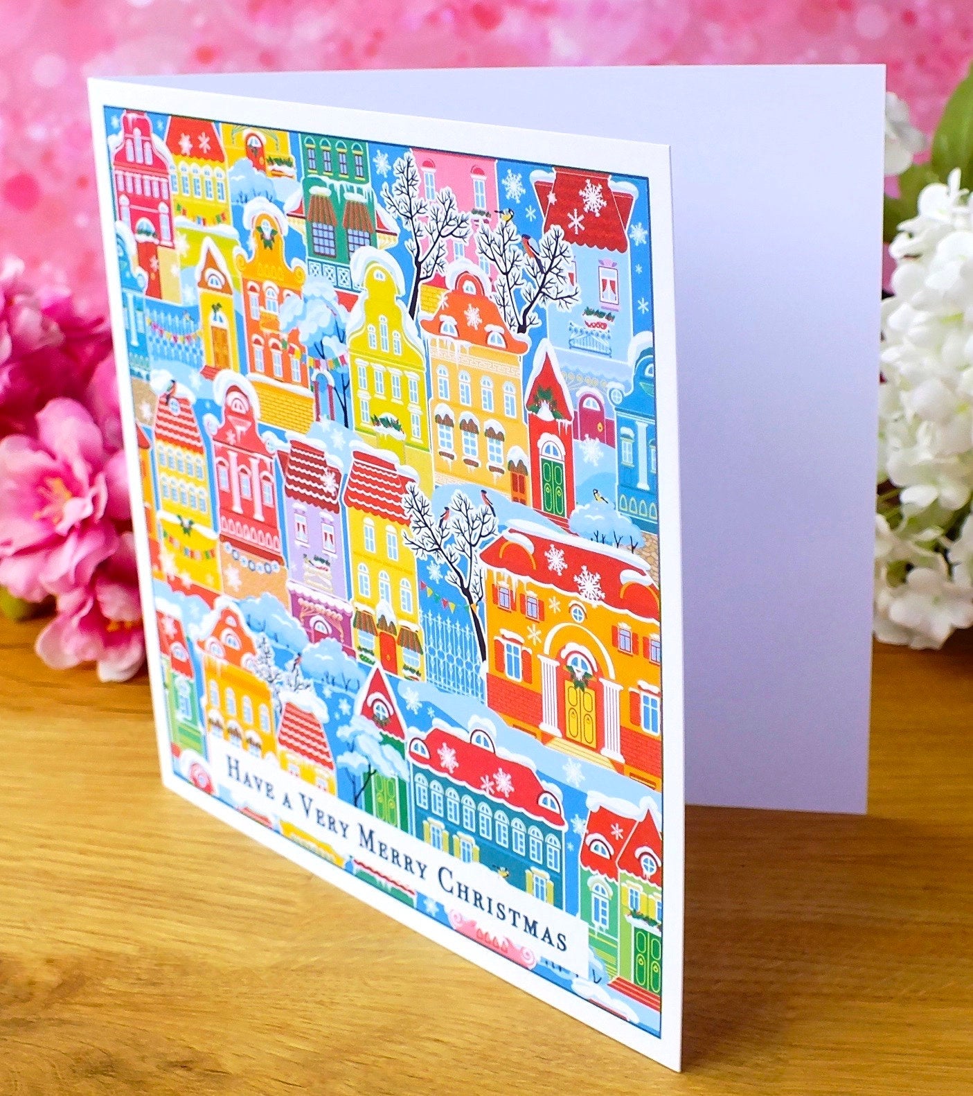 Pack of 4 Colourful Christmas Cards - Snowy Town Houses Inside