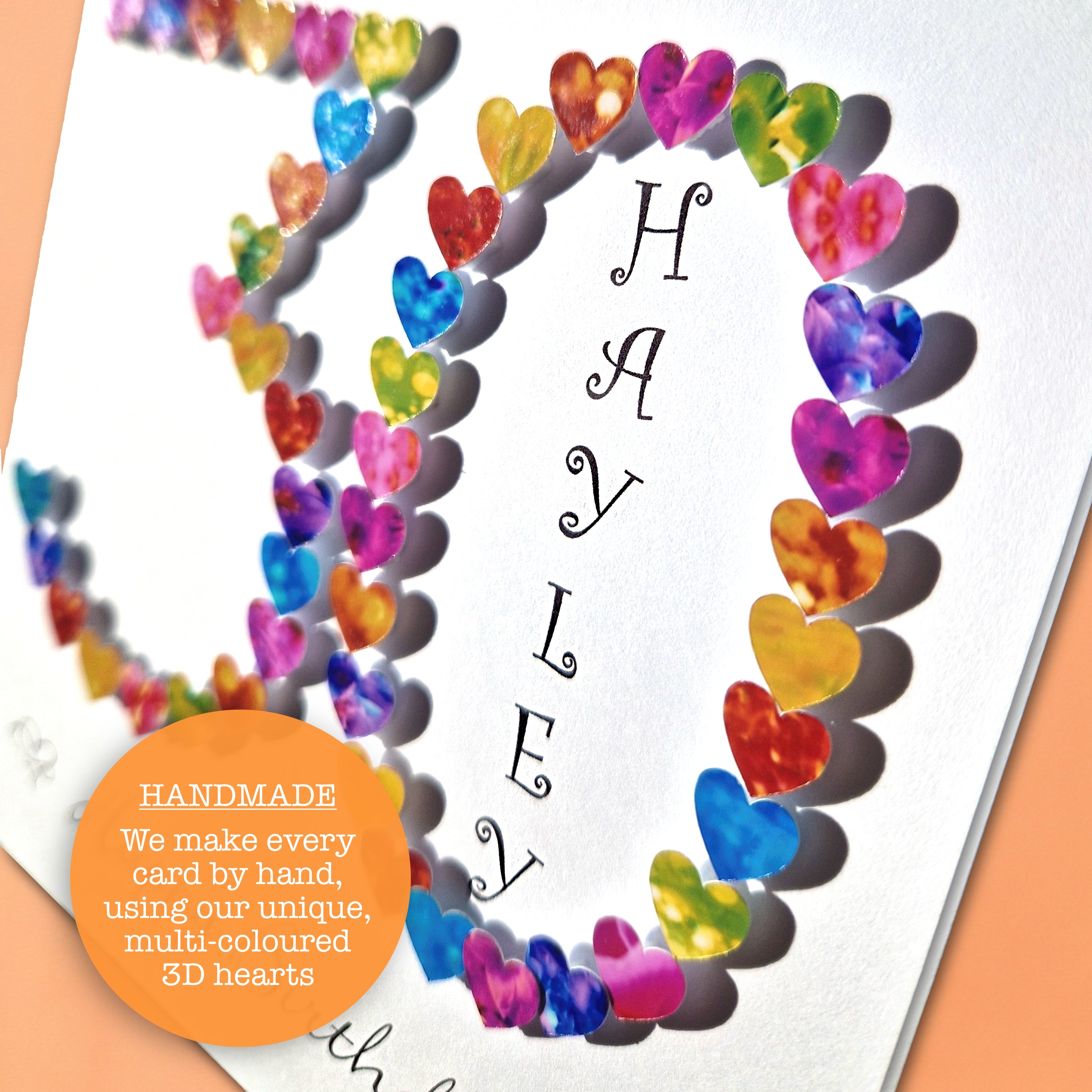 close up detail of a Personalised 30th birthday card with colourful hearts arranged in the number 30 with a name and happy birthday printed on it